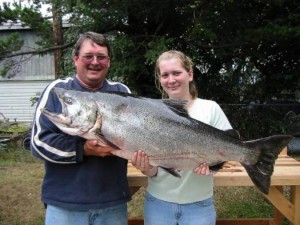 "Biggest King Salmon in our boat in 2004 season" "Rogue River Fishing Guide Les Craig & daughter Lisa with her 48 lb Chinook Salmon"